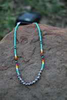 0209 TURQ SEED BEAD NL W/ 6MM FRONT SILVER BEADS