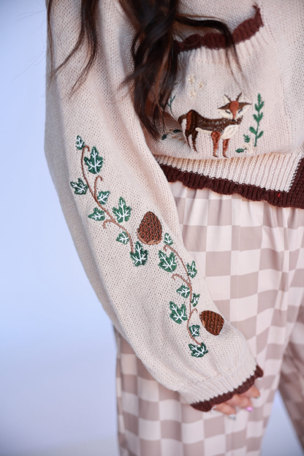 Fox Motif sweater sleeve