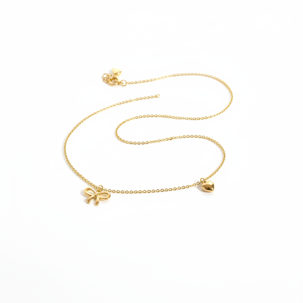 GOLD BOW AND HEART NECKLACE