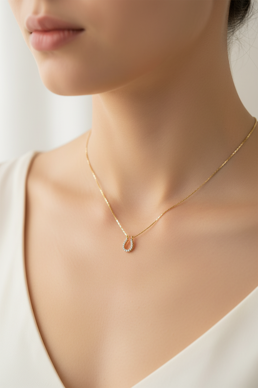 GOLD HORSEHOE PENDANT NL