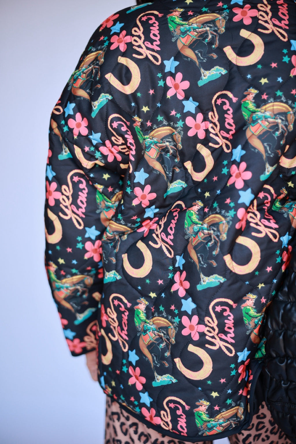 Black Yeehaw quilted jacket fabric