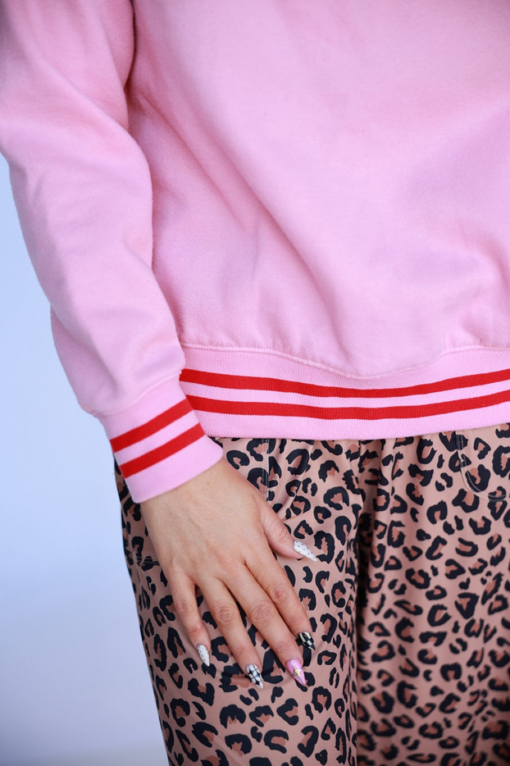 Pink Running Horse Sweatshirt cuff and hem detail