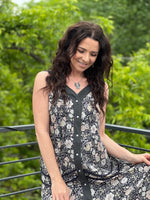 4232 NAVY FLORAL DRESS WITH PEARL SNAP DETAil