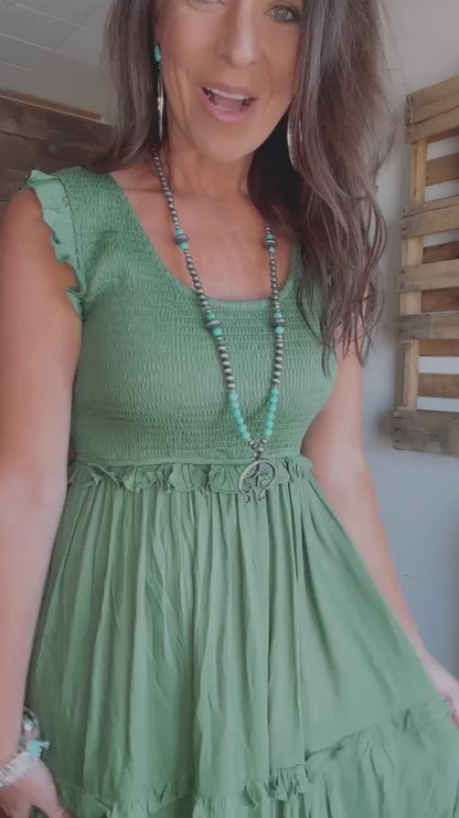 53231 GREEN SMOCKED RUFFLE DRESS